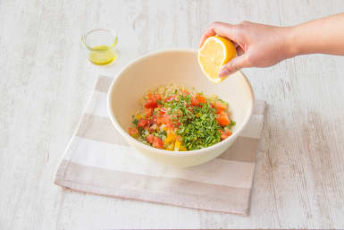 Toss bulgur wheat with cucumber, yellow pepper and tomato