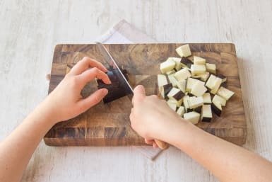 Chop aubergine into 2cm cubes