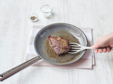 Sear the steak in a pan