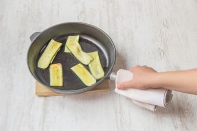 Cook zucchini slices