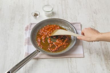 Make the tomato-horseradish vinaigrette