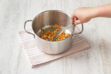 Cook shallot, garlic and carrot