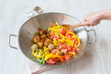 Voeg de paprika toe