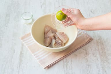 squeeze the lime juice onto the fish