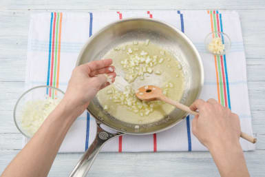 Add garlic to the pan