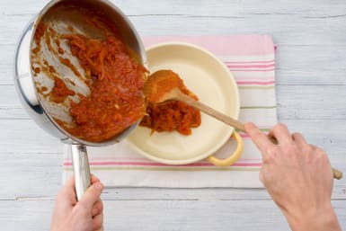 Transfer the sauce to a baking dish