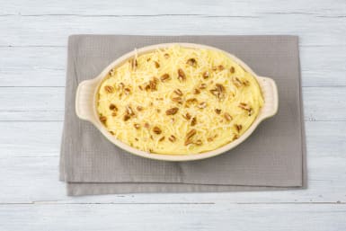 Zet de ovenschaal in de oven.