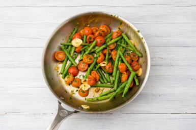 Cook your tomatoes, green beans garlic and parsley