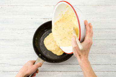 Pour your pancake mixture into the pan