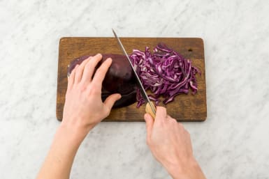 Finely slice the red cabbage