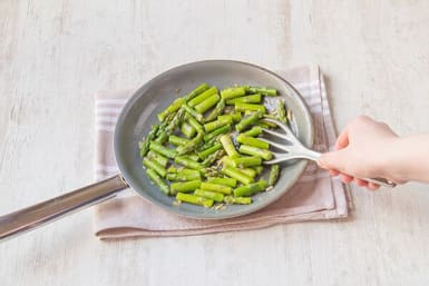 Cook the garlic and asparagus