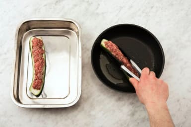 Cook the stuffed zucchinis
