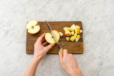 Snijd de appel.