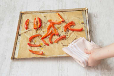 Put your sliced pepper onto a baking tray