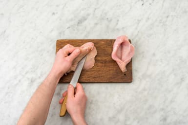 Cut a slit into each chicken breast