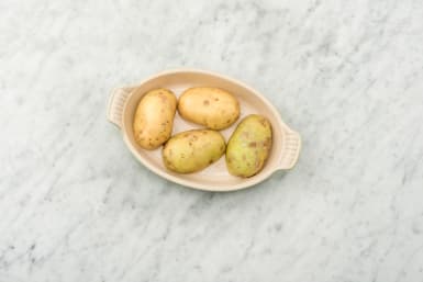 Place potatoes in microwave-safe dish