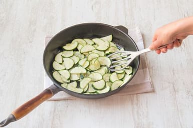 Cook the onion and zucchini