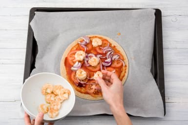 Top the pizza bases