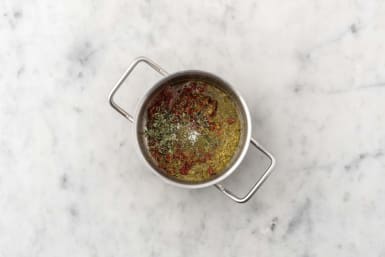 Make pesto-tomato sauce