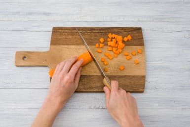 Chop carrot.