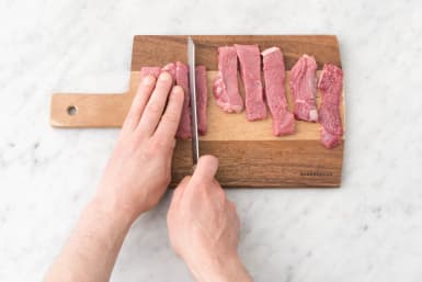 Slice the minute steaks into 2 cm wide strips