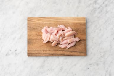 Cut the chicken breast into 1 cm strips