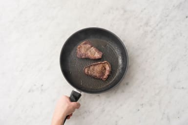Cook the steak on each side