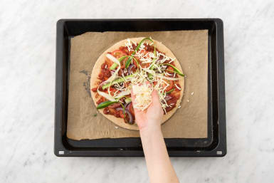 Top the pizza bases