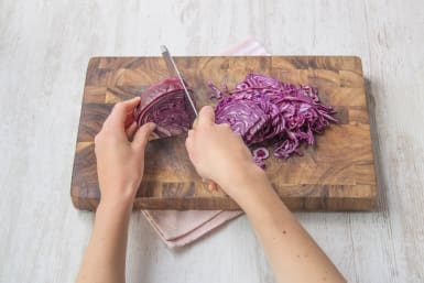 Finely shred the red cabbage