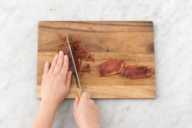 Chop the bacon into small pieces