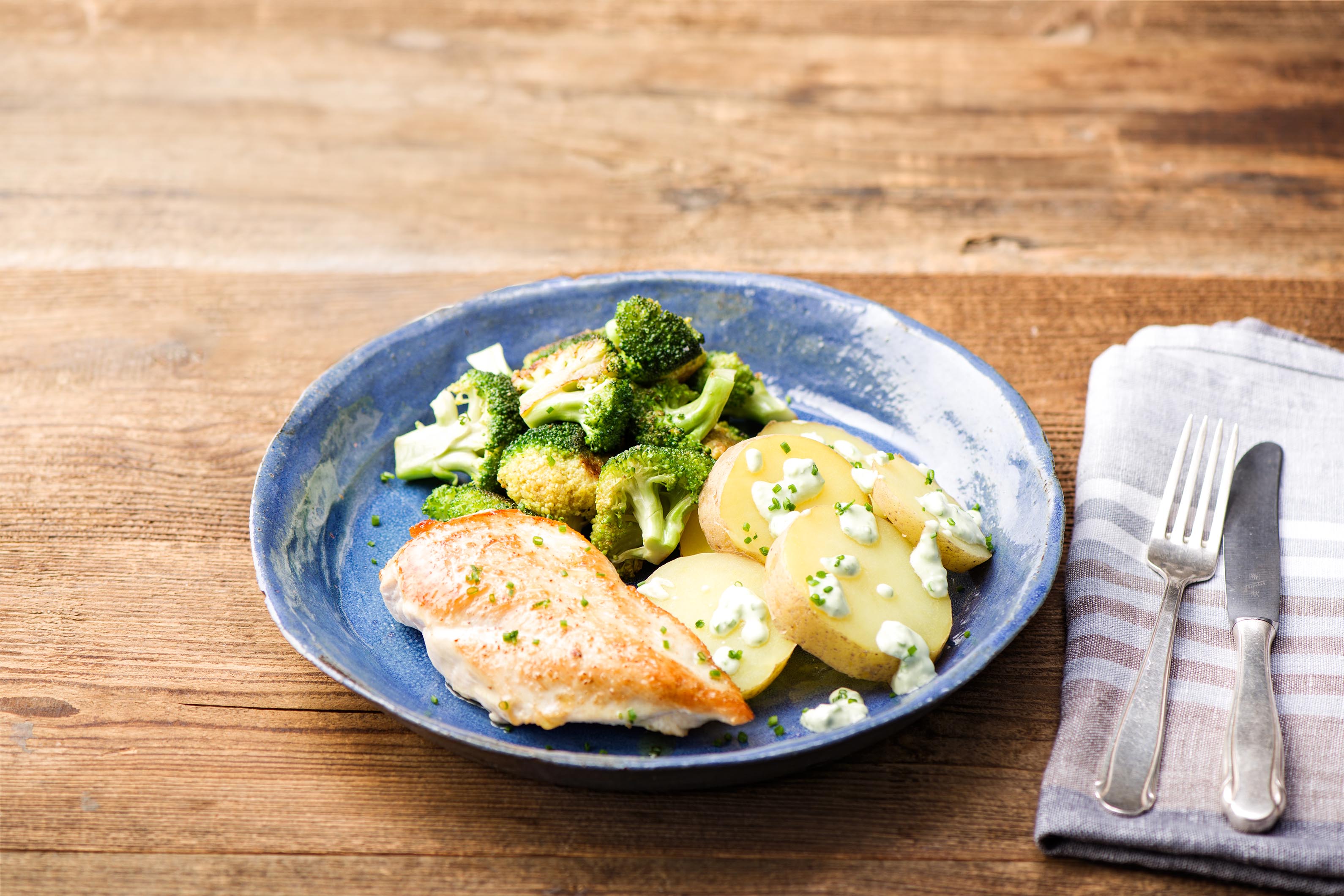 PanSeared Garlic Chicken with Crispy Broccoli and Potatoes Huancaina