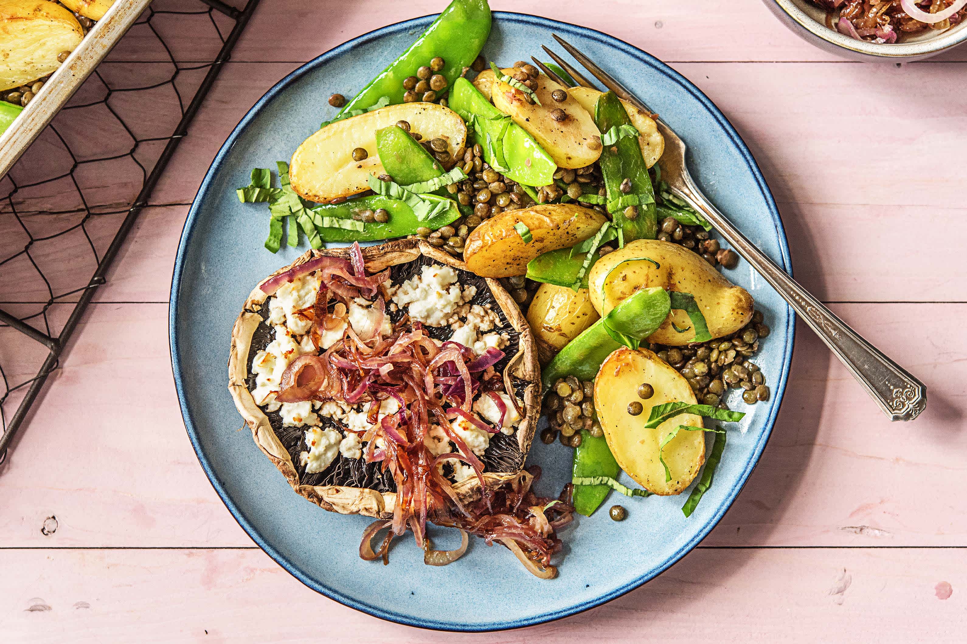 Gevulde portobello met geitenkaas en gekarameliseerde rode ui Recept