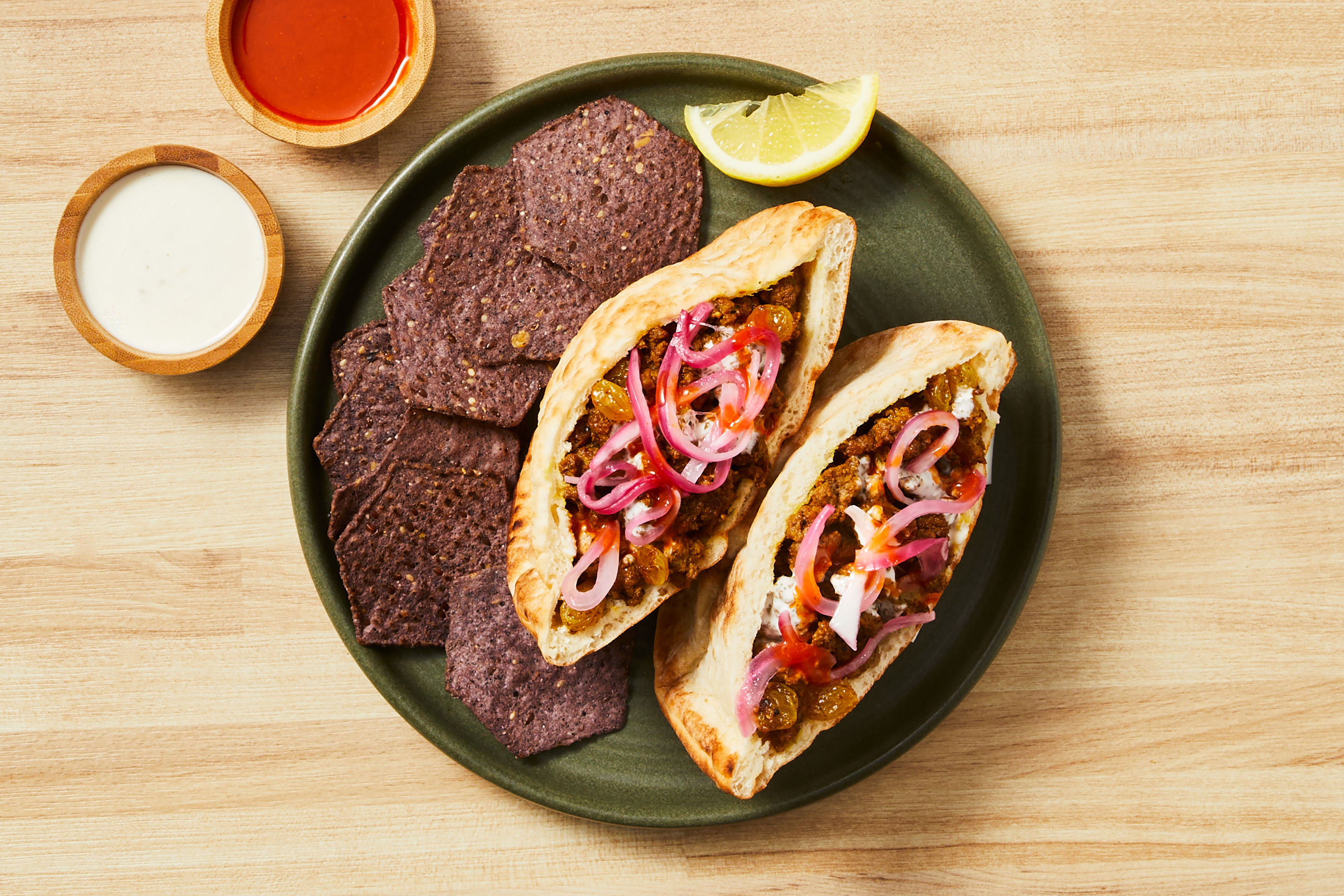 Shawarma Spiced Tofu & Golden Raisin Pitas