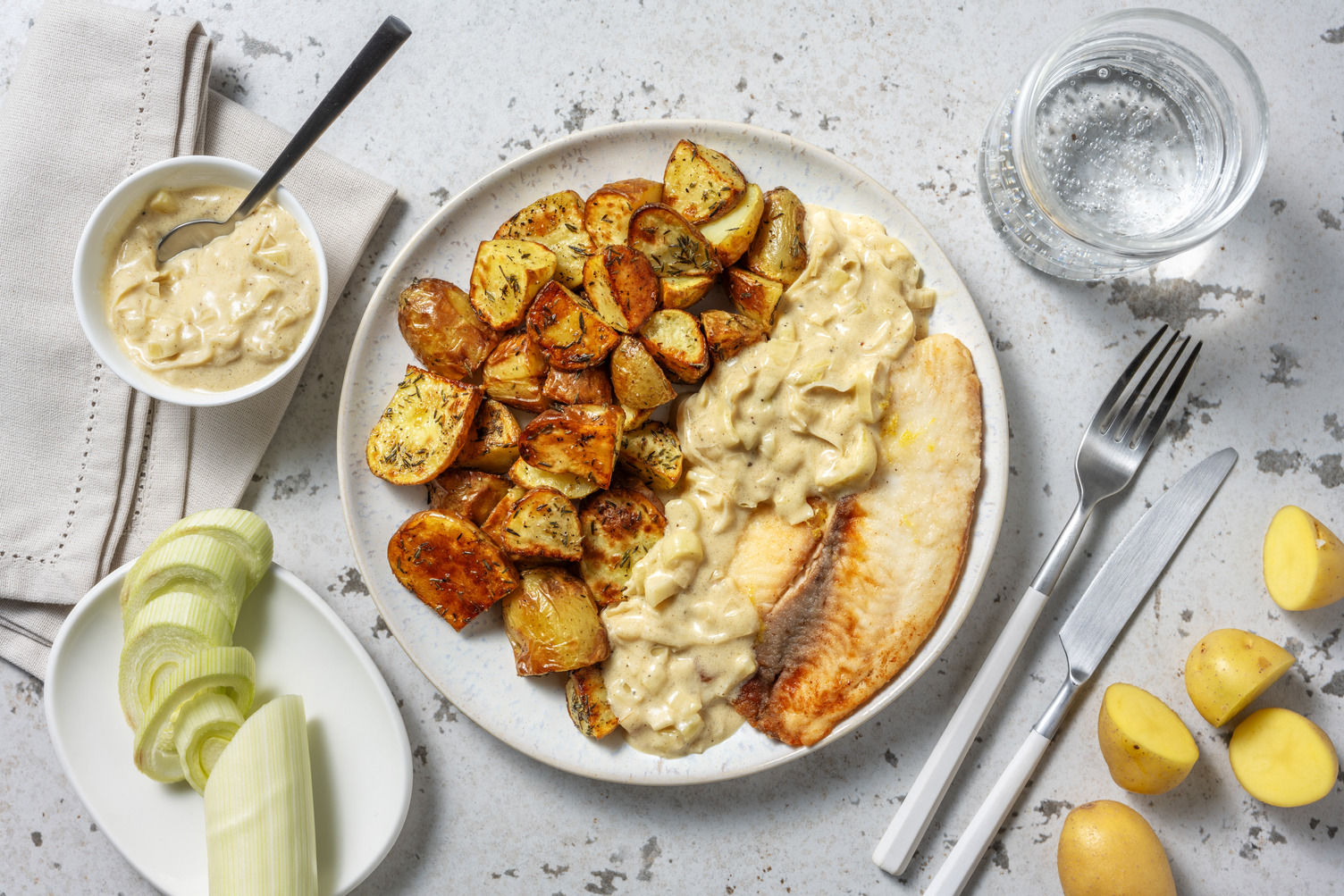 Filet de lieu & fondue légère de poireaux Recette | HelloFresh