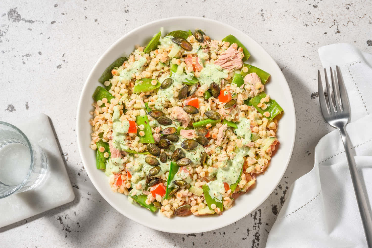 Groene couscous met tonijn en peultjes Recept HelloFresh