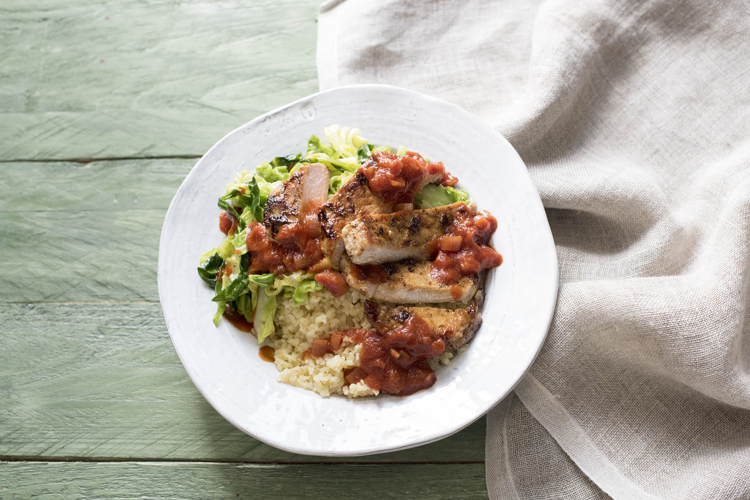 Cajun Pork with Bulgur Wheat and Garlicky Spring Greens Recipe HelloFresh
