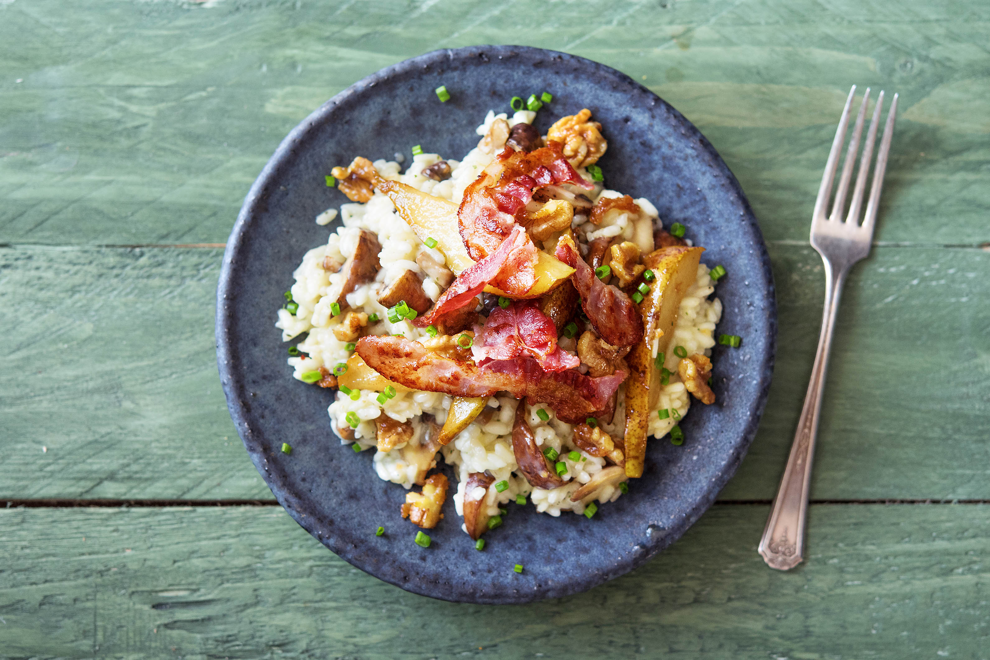 Cremiges Pilzrisotto mit knusprigem Bacon, Rezept | HelloFresh