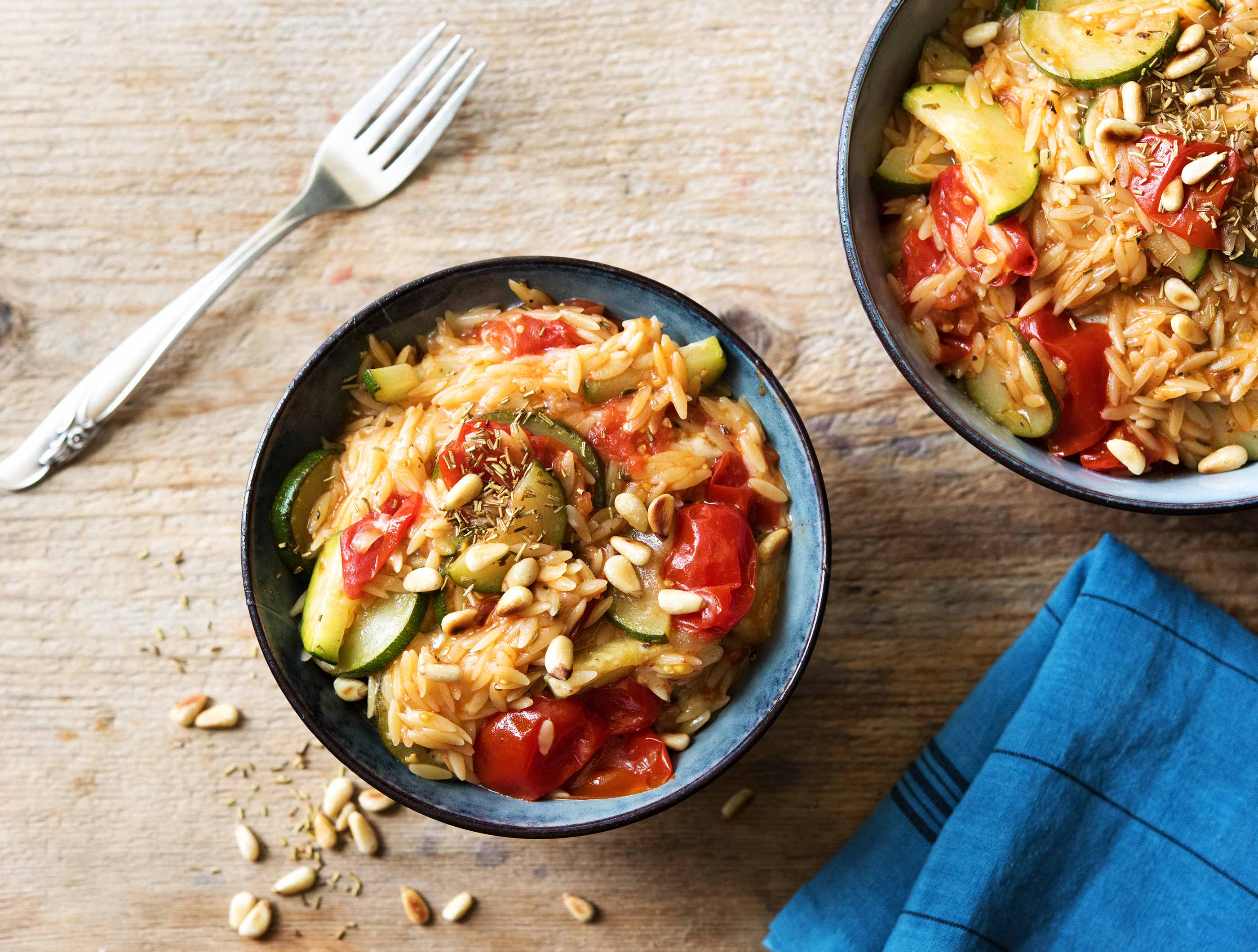 Orzo met courgette, romatrostomaten en gruyère Recept HelloFresh