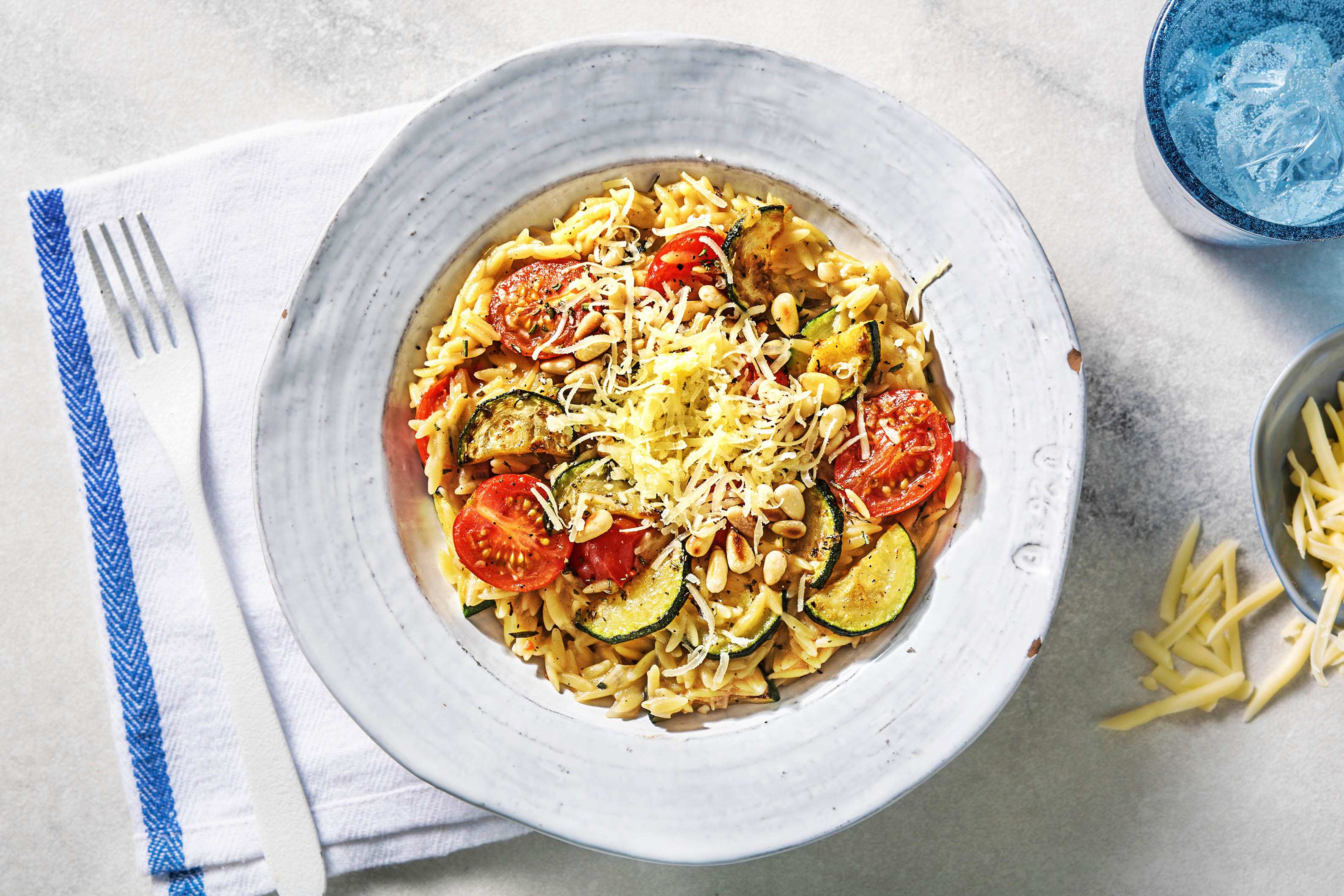 Orzo met cherrytomaten en courgette Recept HelloFresh
