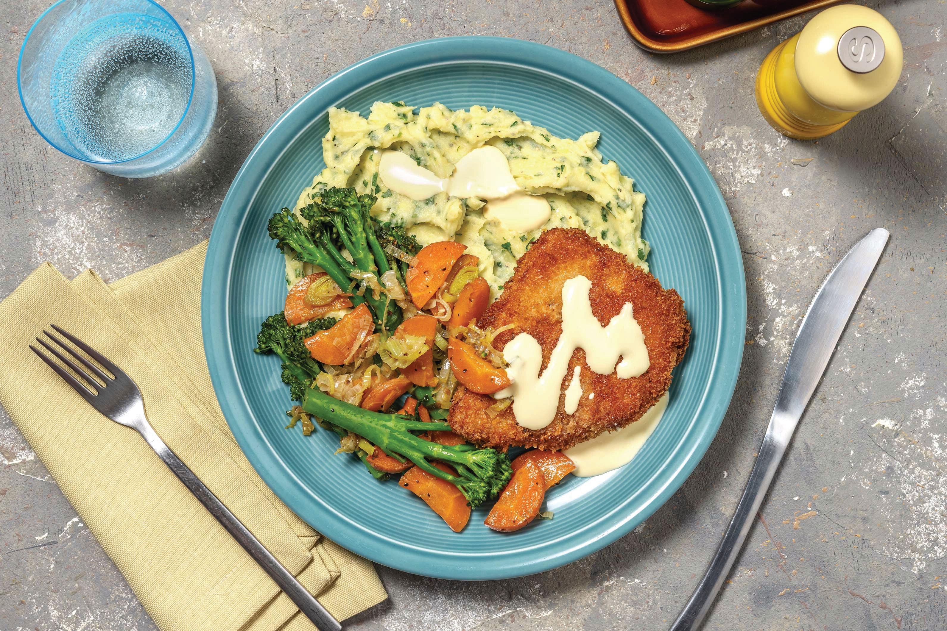 Pork Schnitzel & Herby Mash with Garlic Veggies & Hollandaise Recipe