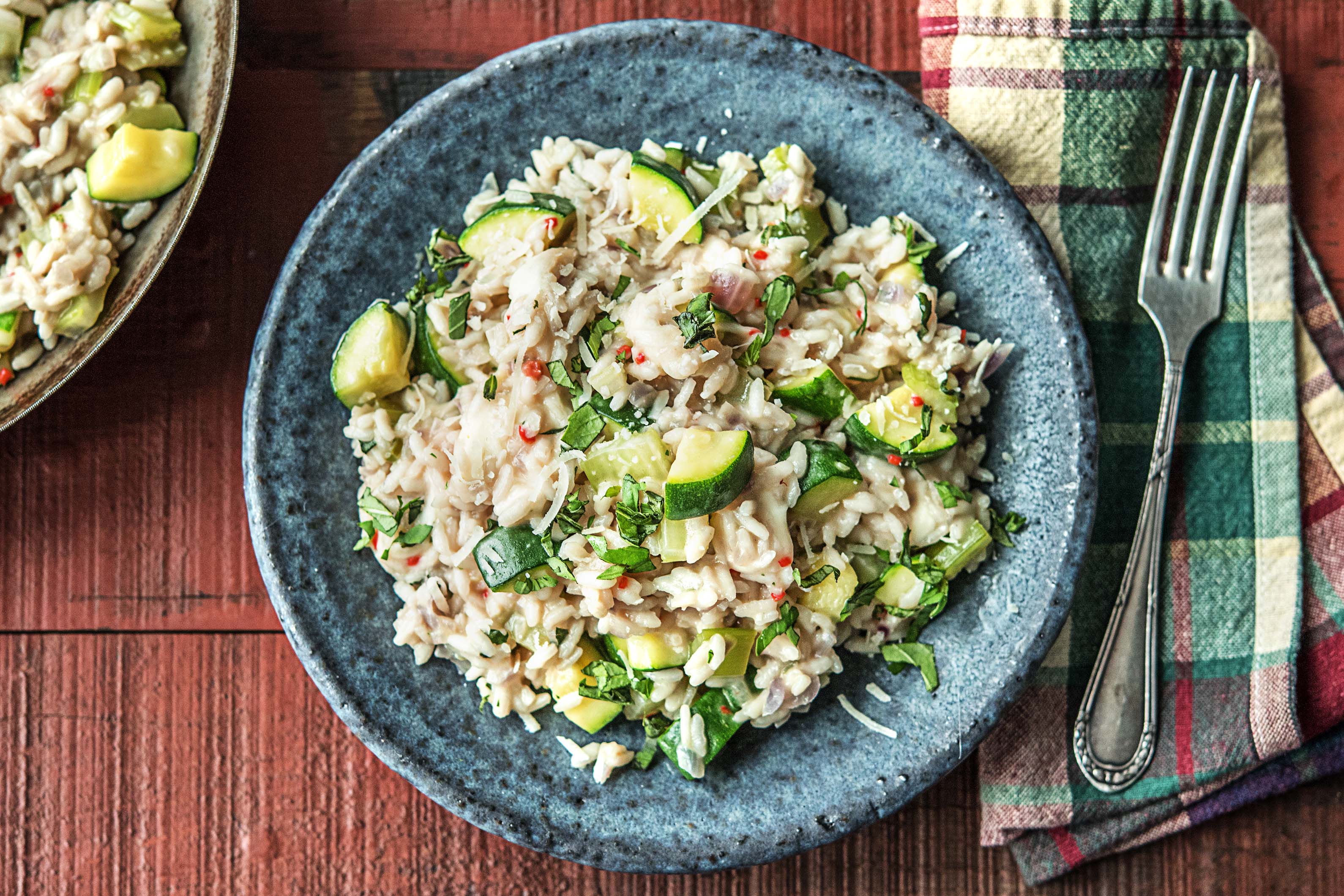 Romige risotto met courgette, bleekselderij, mozzarella en verse
