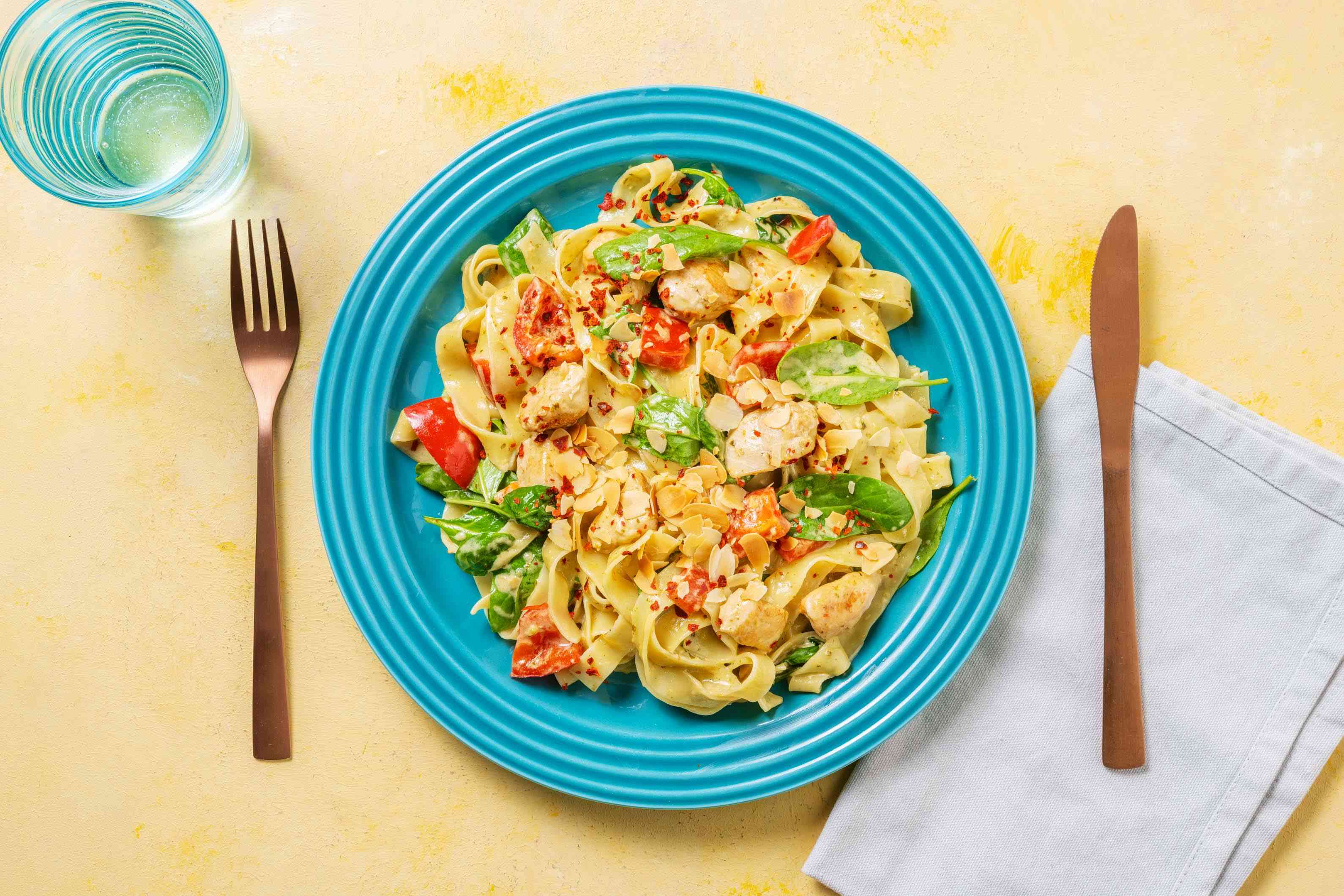 Cheesy Chicken Pesto Fettuccine with Flaked Almonds Recipe HelloFresh