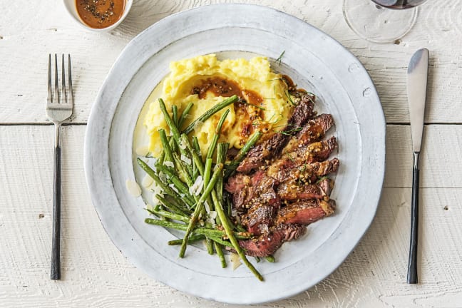 Strip Steak Over Truffled Mashed Potatoes