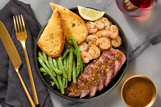 Steak au Poivre & Garlic Herb Shrimp