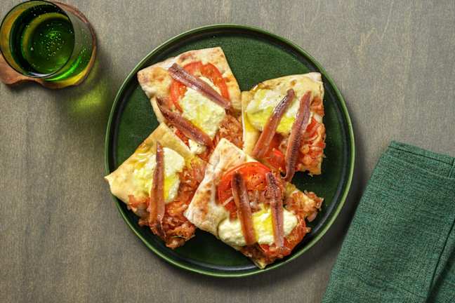 Pinsa saporita alle alici e ricotta 