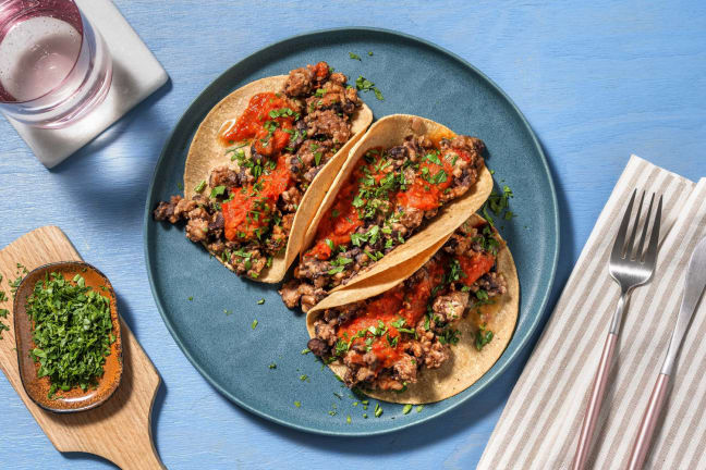 Mini tacos di maiale e fagioli neri