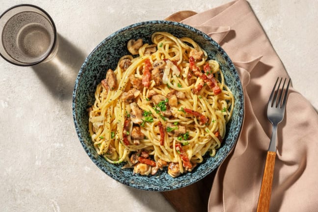 Linguine met champignonroomsaus en spekjes