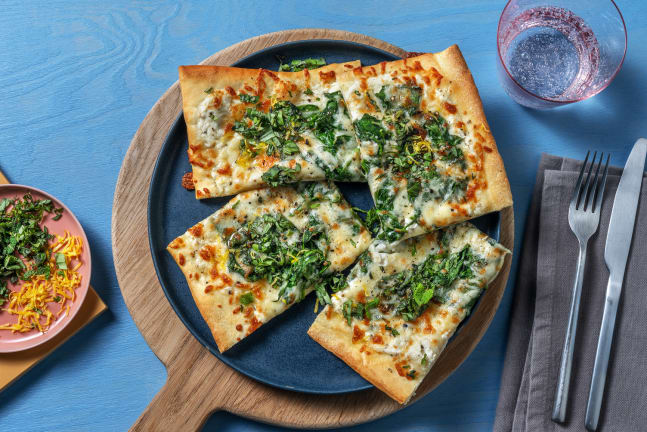 Pizza à la ricotta et jeunes pousses d'épinards