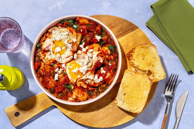 Shakshuka-aardappelen met knoflookbrood