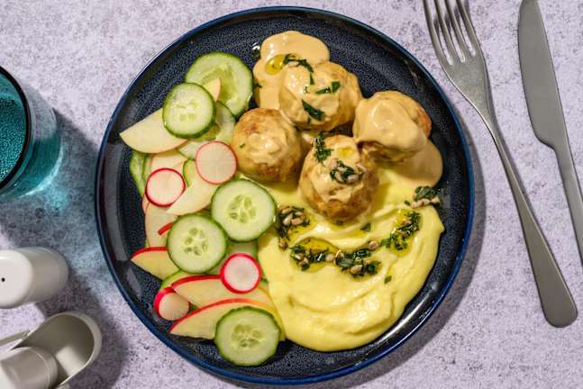 Fläskfärsköttbullar i krämig gräddsås